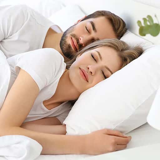 a couple sleeping peacefully, trusting softwave therapy